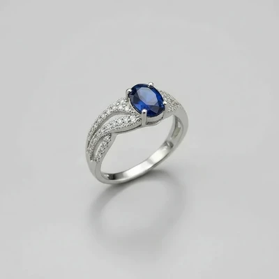 انگشتر نقره زنانه جواهری با سنگ اتمی آبی 110053