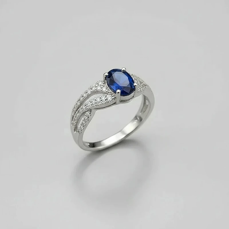 انگشتر نقره زنانه جواهری با سنگ اتمی آبی 110053